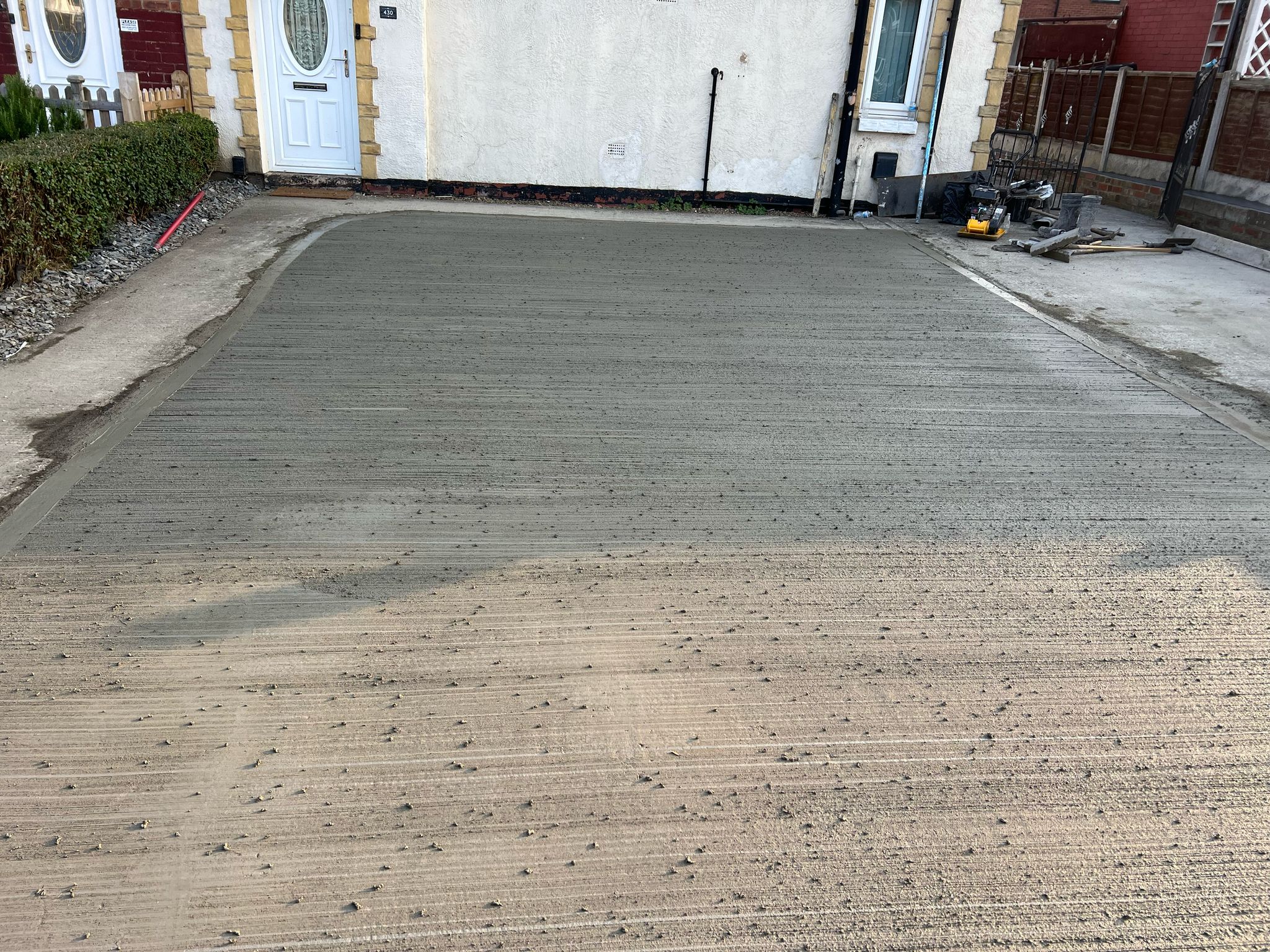 freshly poured concrete driveway