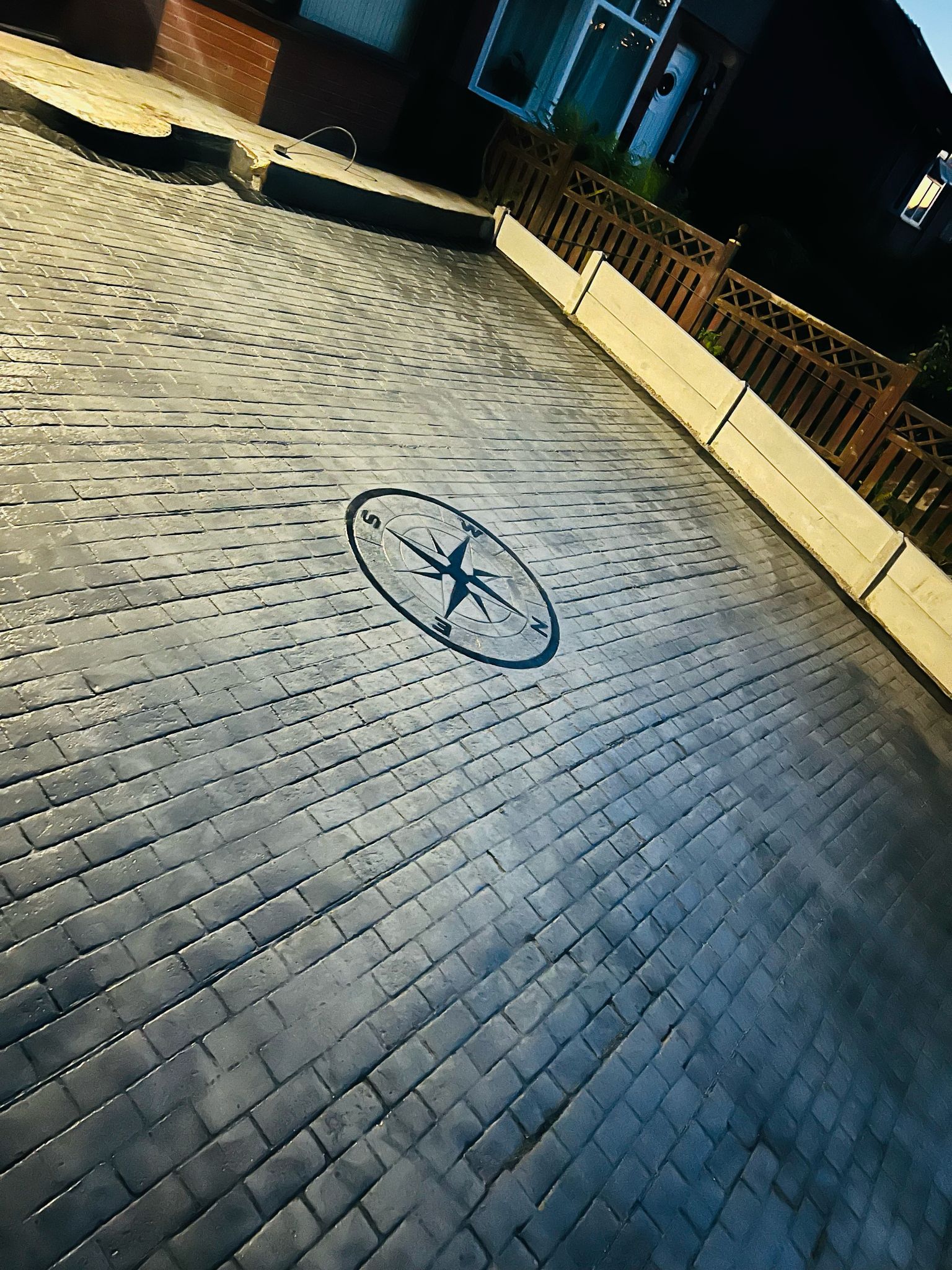 Running bond or herringbone brick pattern in imprinted concrete